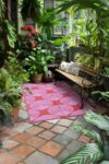 rockettstgeorge-Recycled-Plastic-Garden-Rug-In-Pink-_amp_-Red-lowres-lifestyle_1