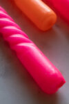 rockettstgeorge-Set-of-4-Twisted-Dinner-Candles-in-Hot-Pink_Orange-lores_aae64086-757a-4c46-8b98-c5a7de2d8e39