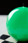 rockettstgeorge-green-sphere-candle-lowres-lifestyle